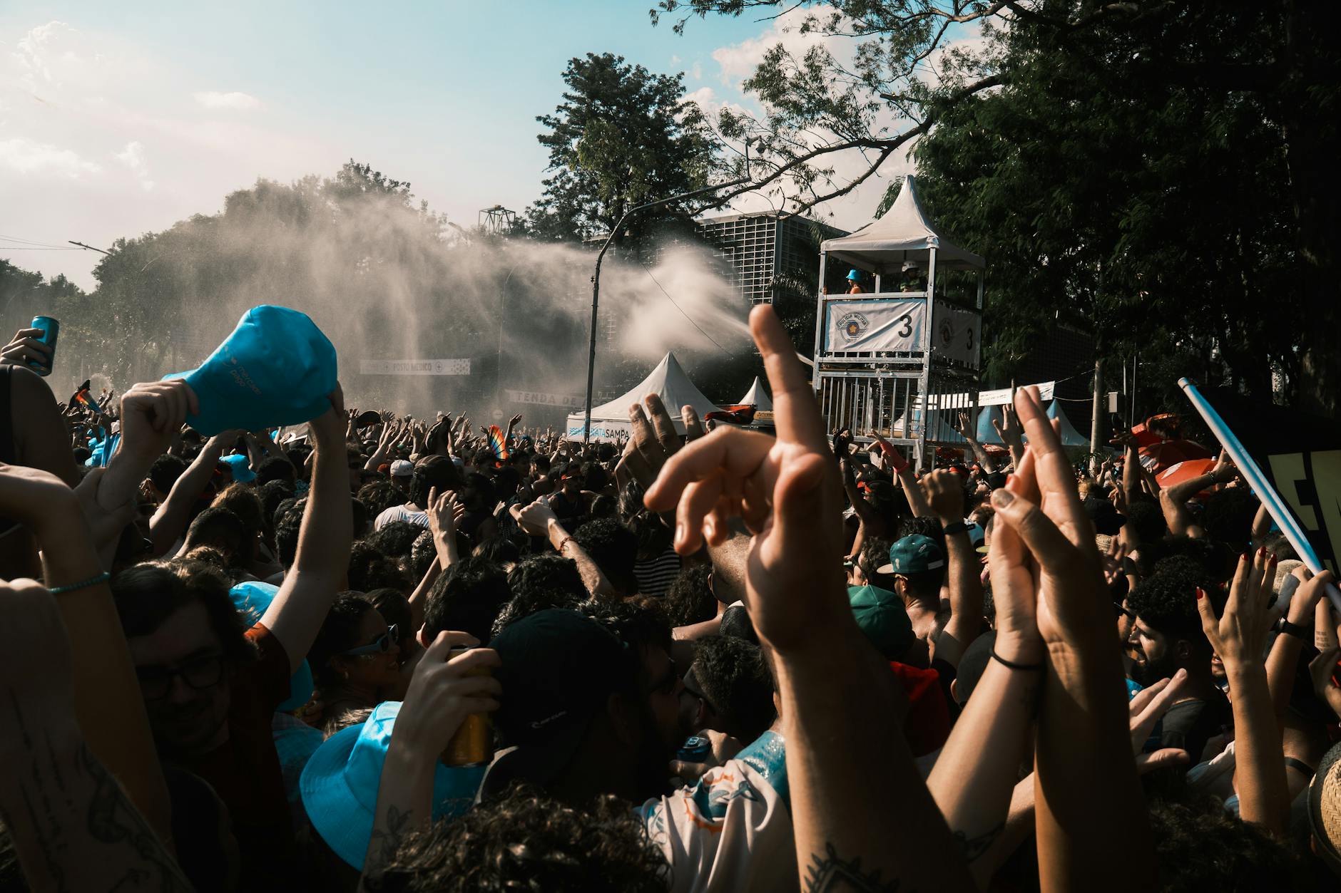 Crowds enjoying a vibrant outdoor music festival, similar to Liverpool events and festivals throughout summer