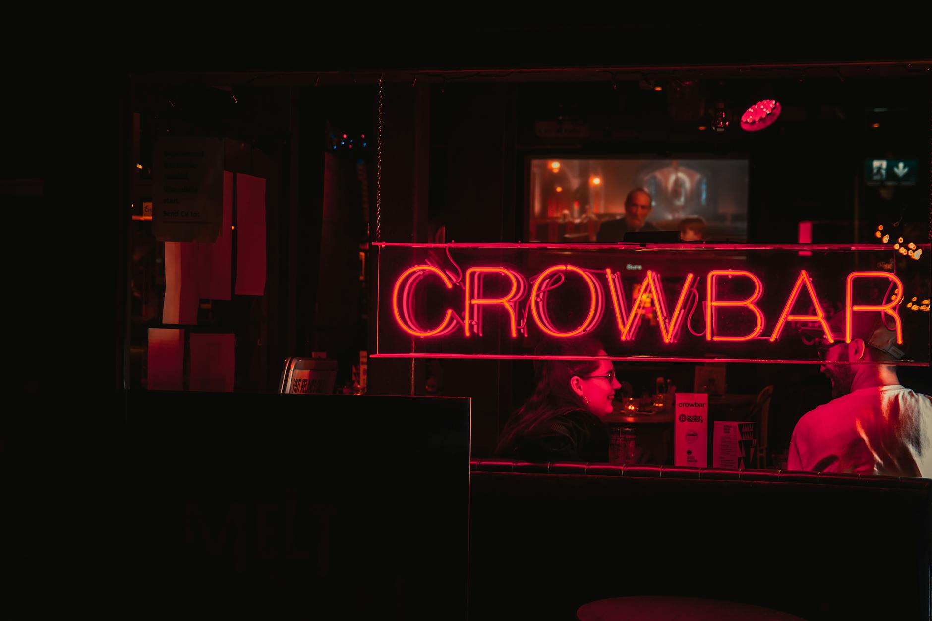 Liverpool Nightlife Guide: Bars, Clubs & Live Music 1 Liverpool's vibrant nightlife scene with neon-lit bars and clubs across the city centre