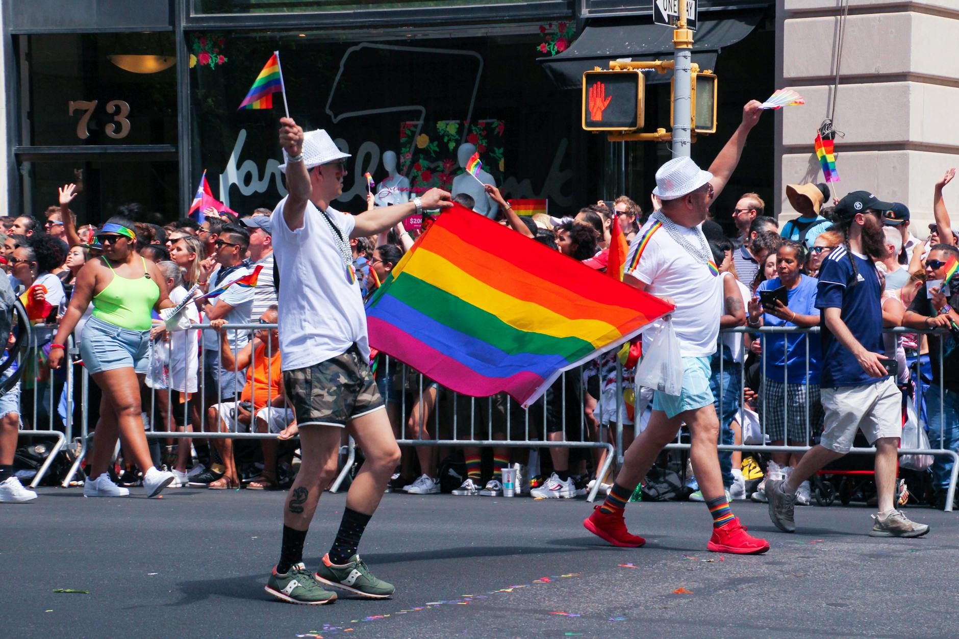 Vibrant Pride parade with rainbow flags and celebrations, like Liverpool's annual Pride event