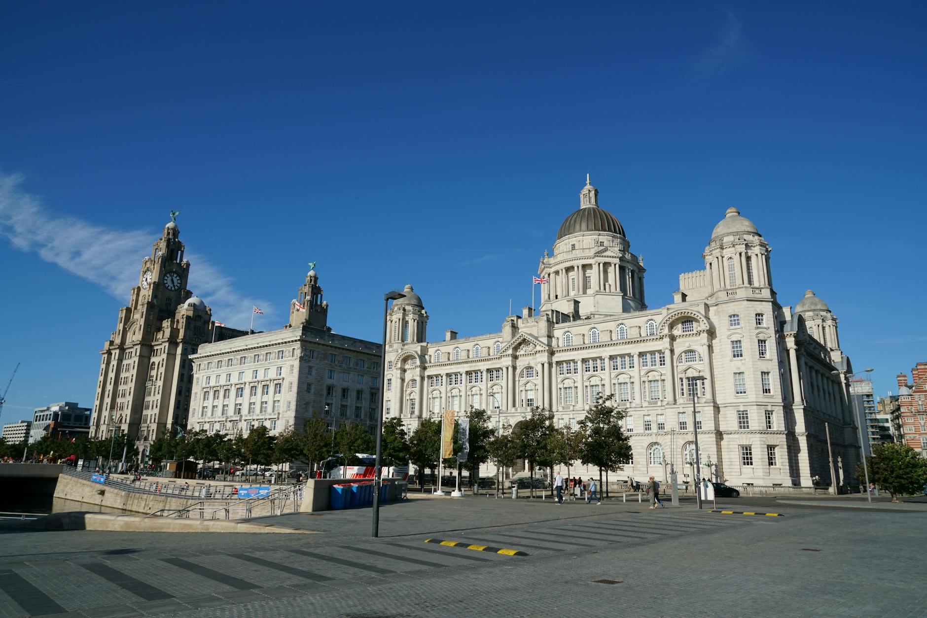 Free Walking Tours in Liverpool: Every Operator Compared (2026) 2 Walking tour group at Liverpool waterfront Mersey Pier Head free tours