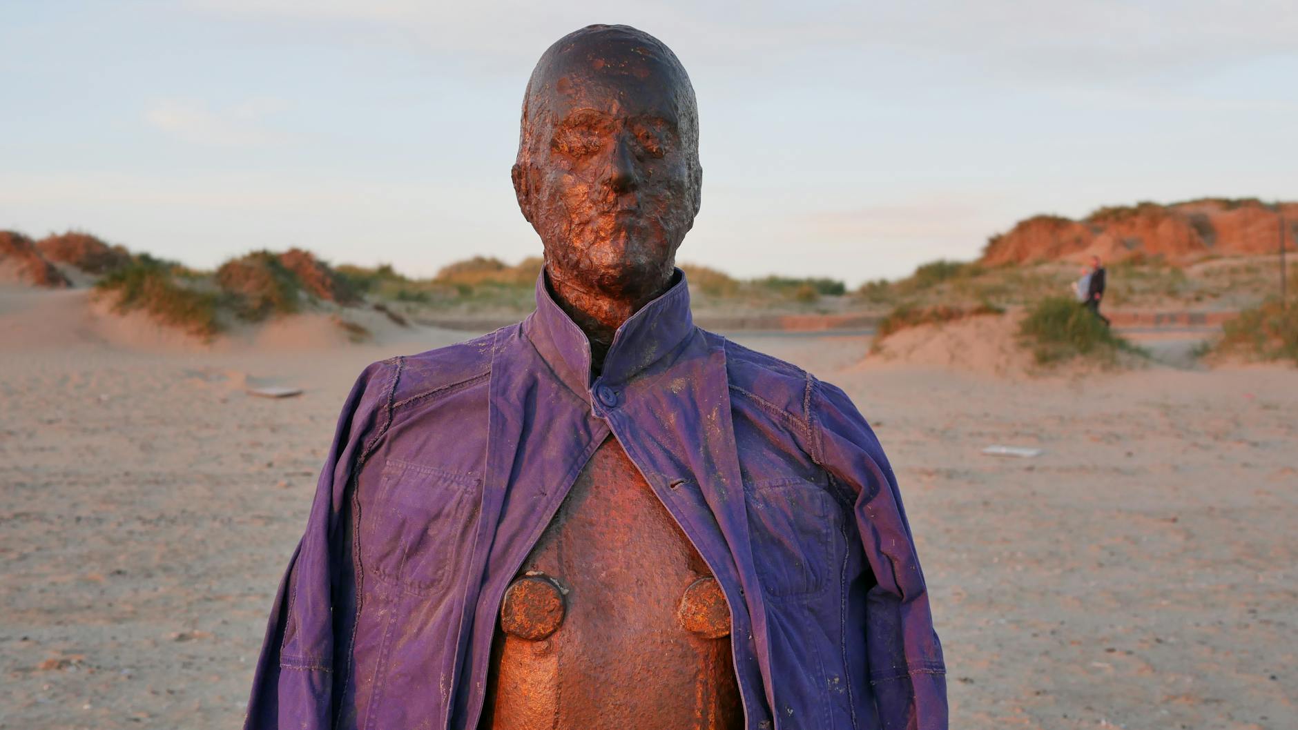 Crosby Beach & Antony Gormley's Another Place: Visitor Guide 3 Iron man statue Crosby Beach sea Antony Gormley sculpture