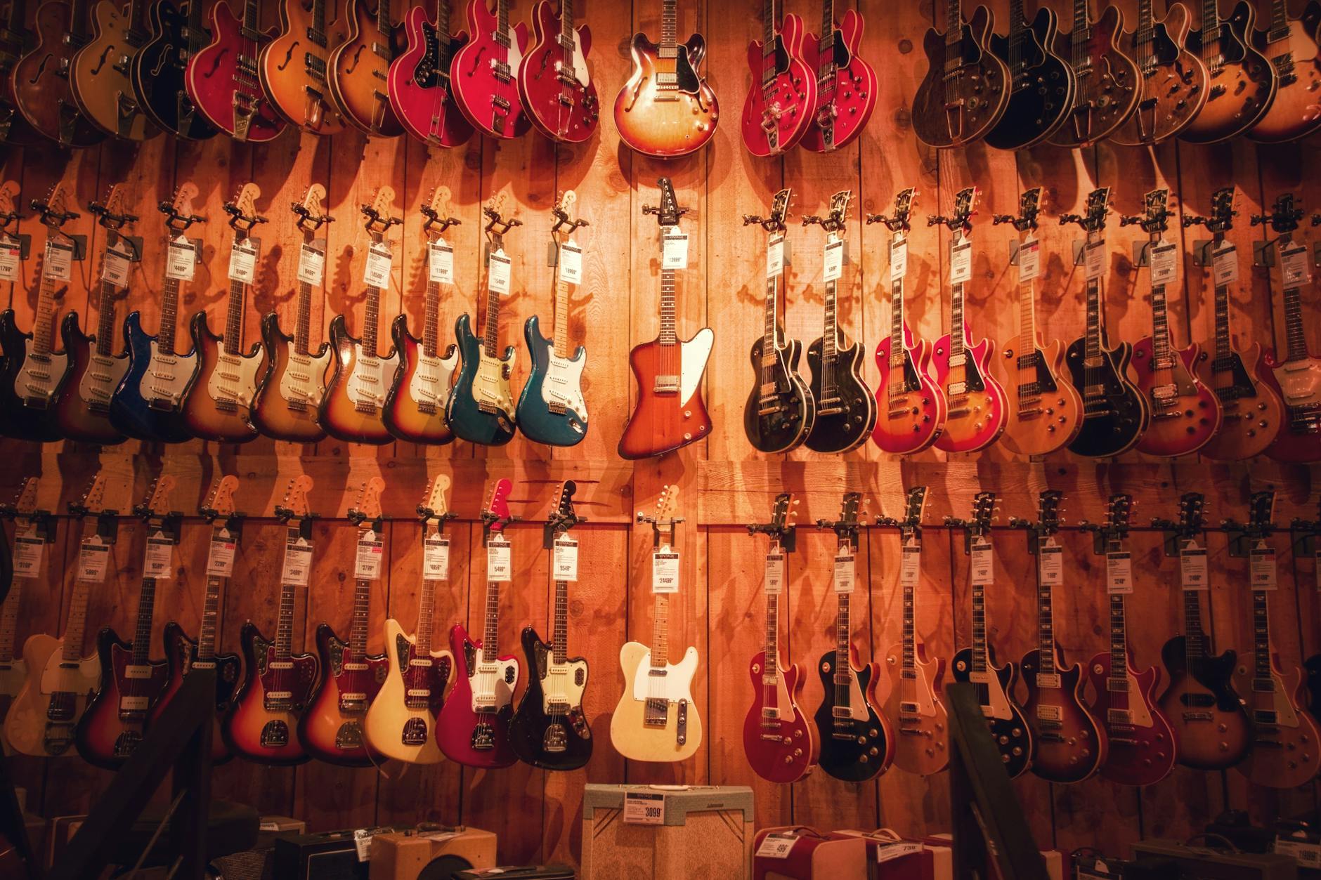 Liverpool Live Entertainment: Arena, Theatres & Comedy Guide 3 Vintage electric guitars on display in a Liverpool music exhibition