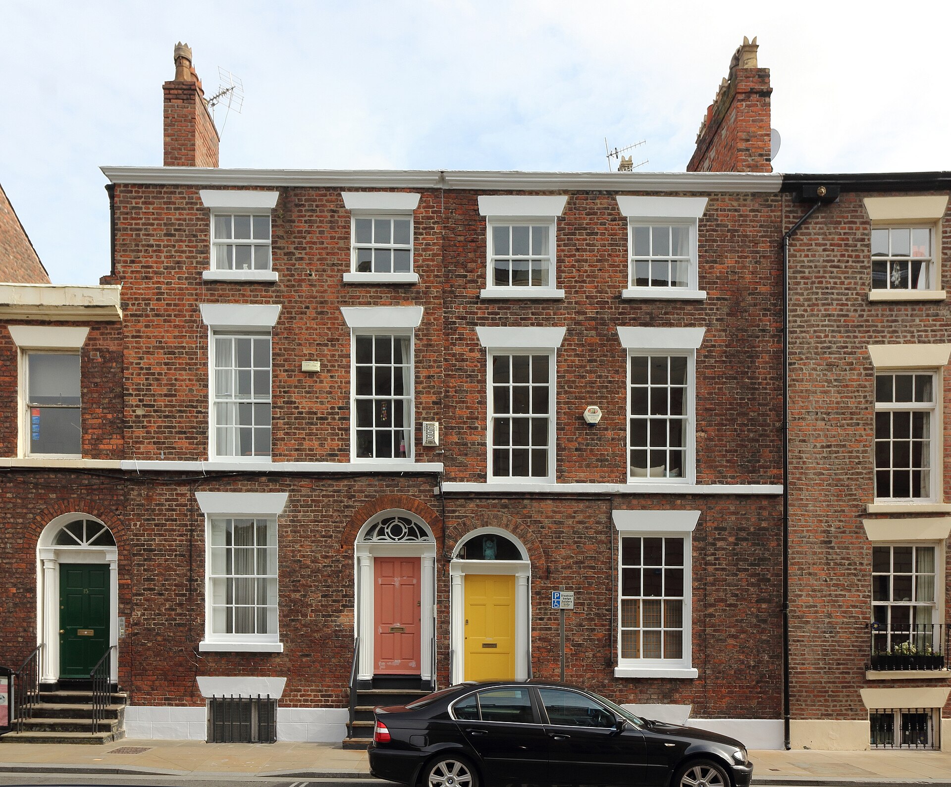 Bottomless Brunch in Liverpool: Best Venues & Prices Compared 2 A terrace of Georgian red-brick town houses with colourful front doors and fanlights on Hope Street, Liverpool
