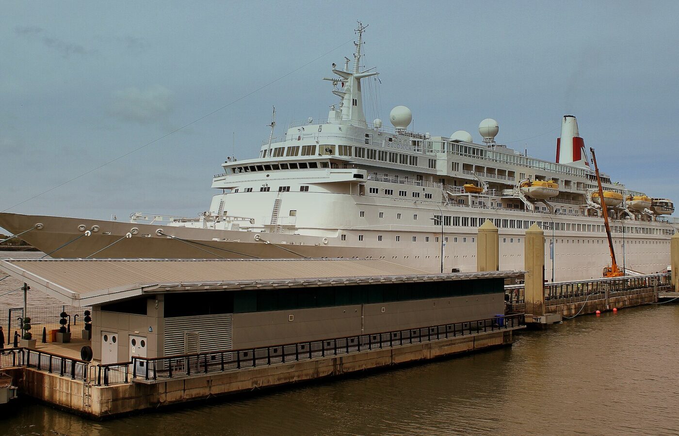 A cruise ship berthed alongside the landing stage at Liverpool Cruise Terminal on the Mersey