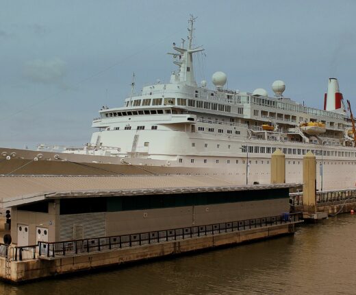 A cruise ship berthed alongside the landing stage at Liverpool Cruise Terminal on the Mersey