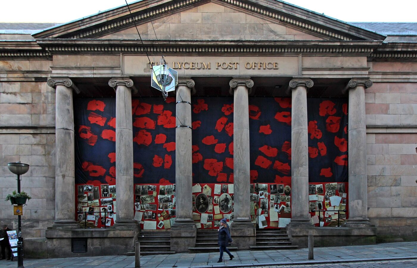 Competitive Socialising in Liverpool: Crazy Golf, Darts & Escape Rooms 4 The Lyceum on Bold Street, Liverpool: a Georgian stone building with a pediment, six Ionic columns and 'The Lyceum Post Office' lettering, its windows covered by a poppy-print hoarding