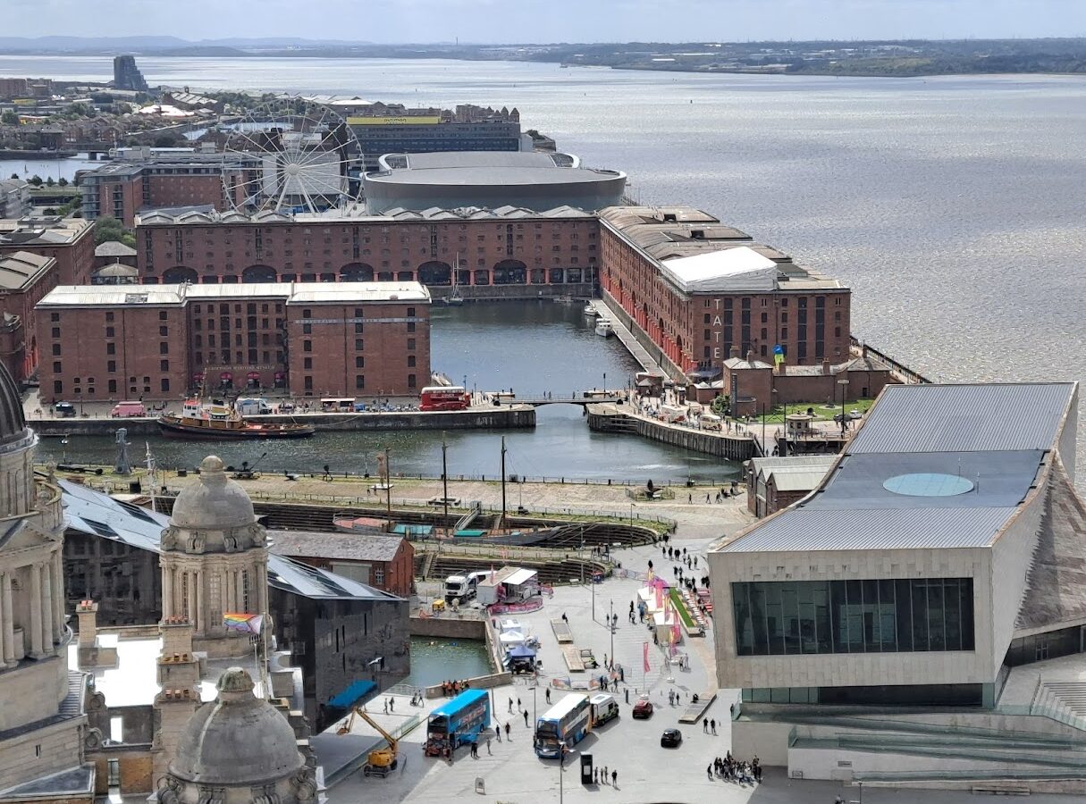 Liverpool Maritime History: From Empire Port to Modern Waterfront 3 Liverpool's Royal Albert Dock warehouses surround their basin, with smaller docks, the Museum of Liverpool and Mersey nearby.